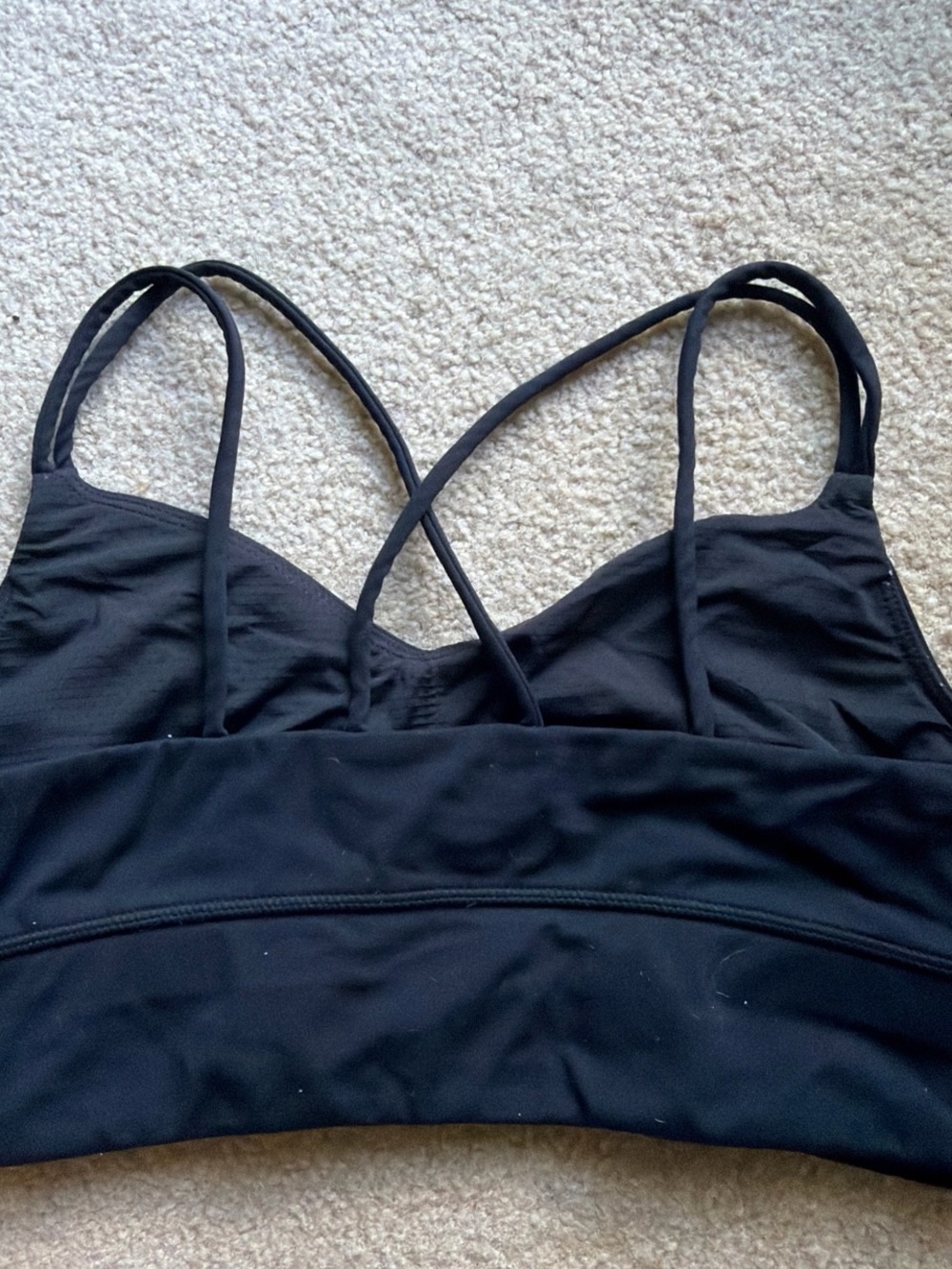 Black sports bra with crossed back